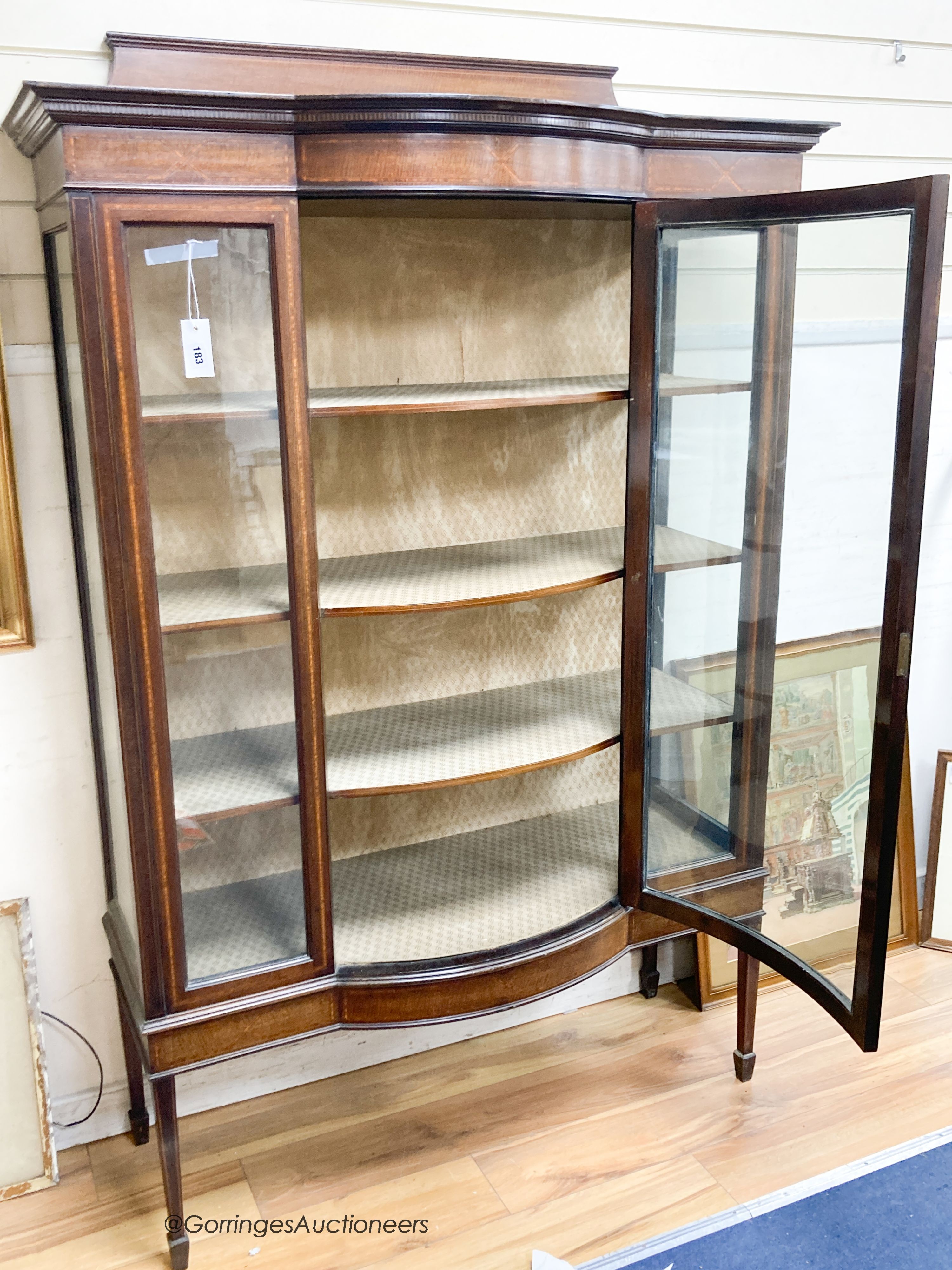 An Edwardian satinwood banded bow front mahogany display cabinet, width 115cm, depth 45cm, height 178cm